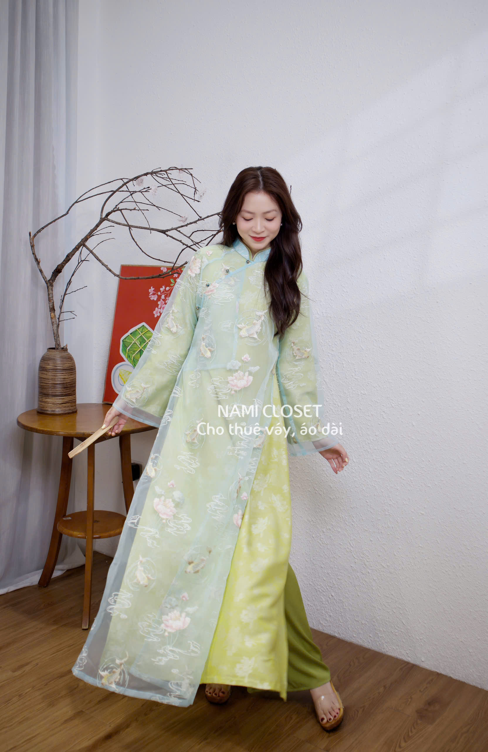 Áo dài xanh Huyền Thái